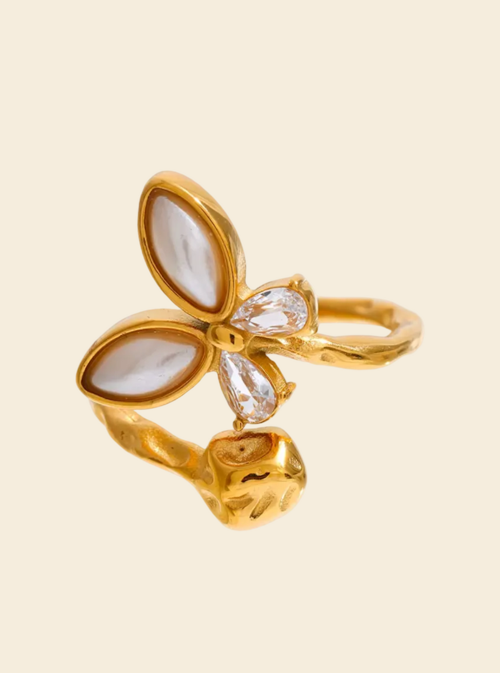 Gold ring with butterfly design on a white background