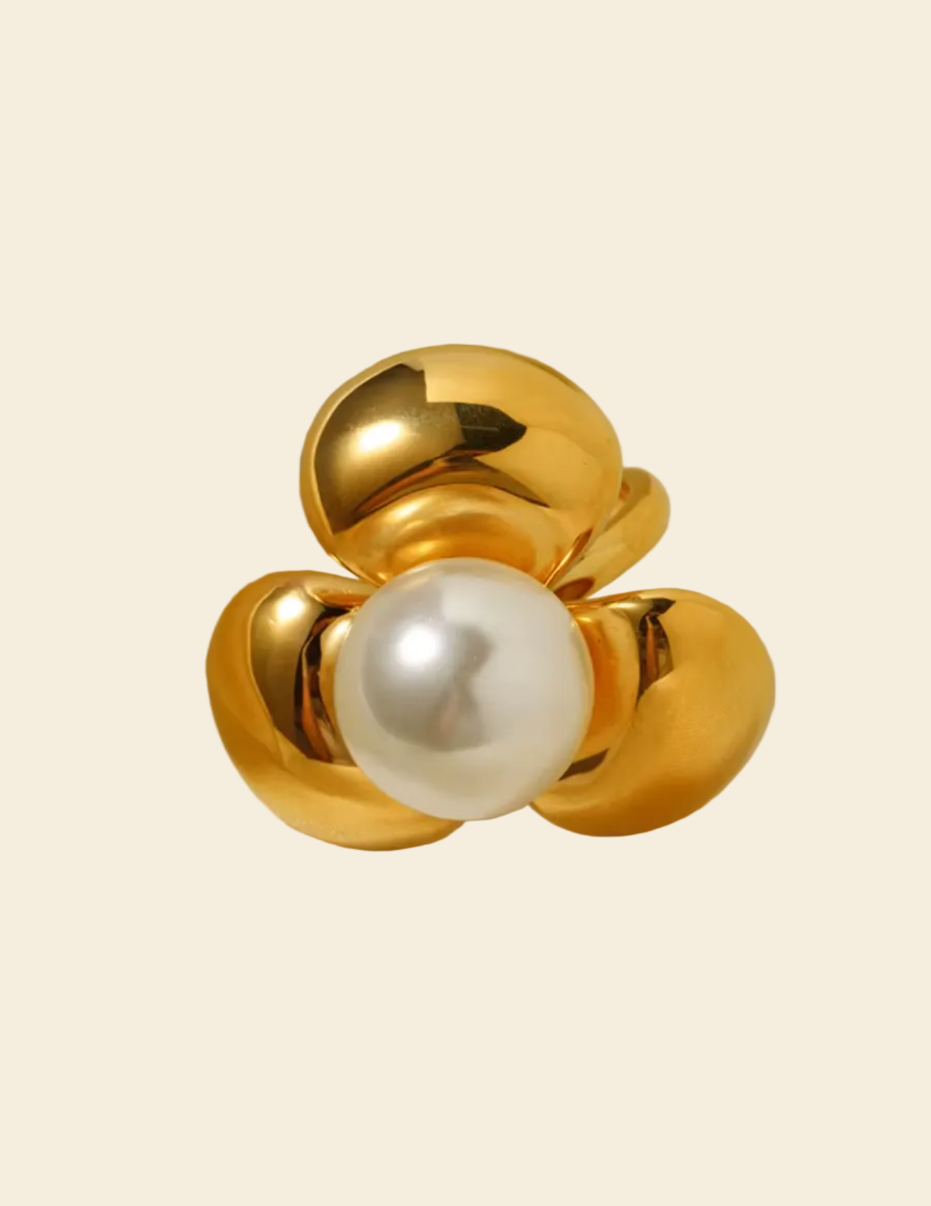 Gold ring with a pearl on a white background
